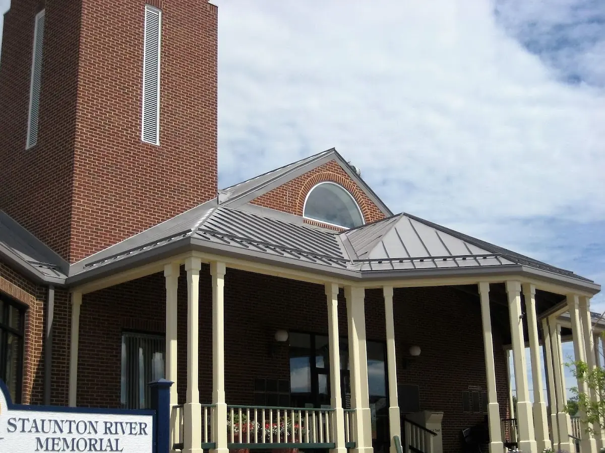 Skilled roofing craftsmen working on a residential roof in Kettletown
